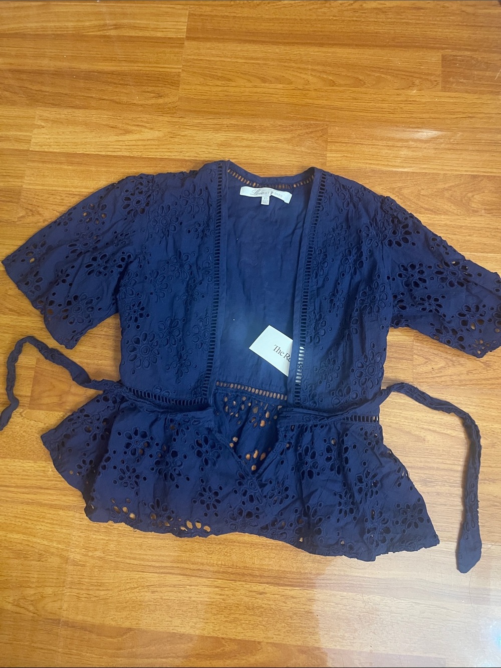 Navy Eyelet Tie-Waist Peplum Top